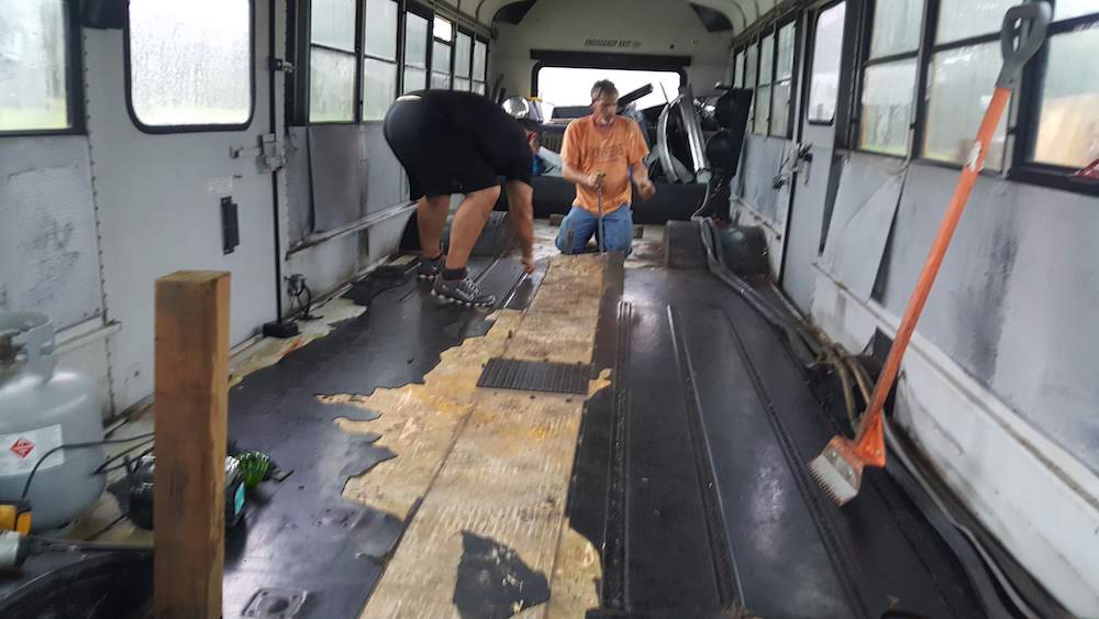 removing old rubber floor in skoolie